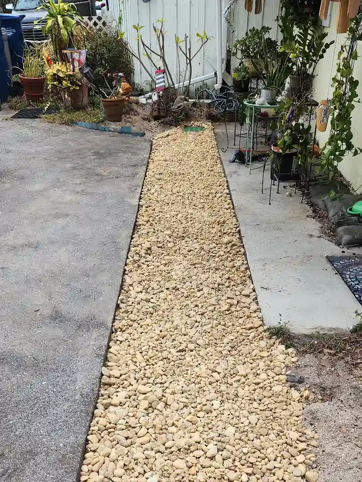Gravel drainage strip finished beside a walkway, South Bradenton